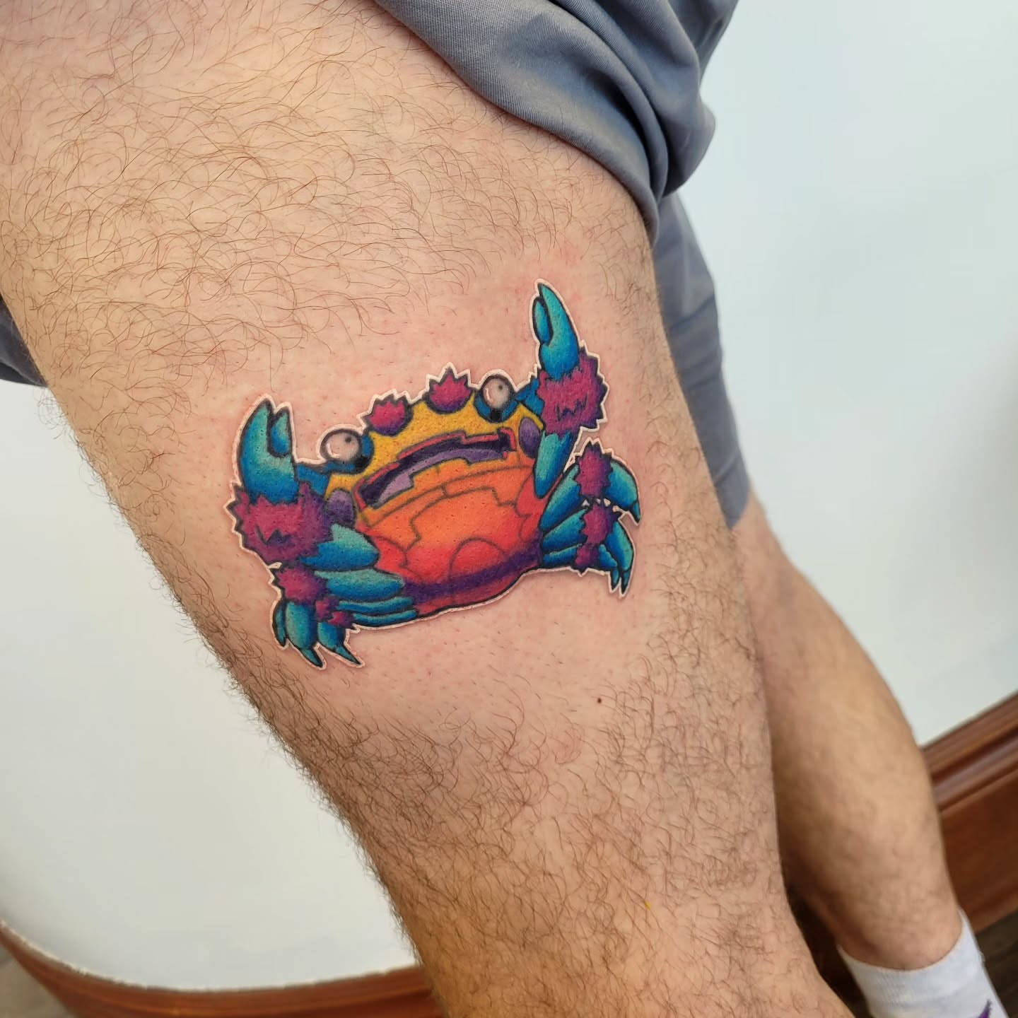 Crab new school tattoo on the thigh by Wray Saulsberry