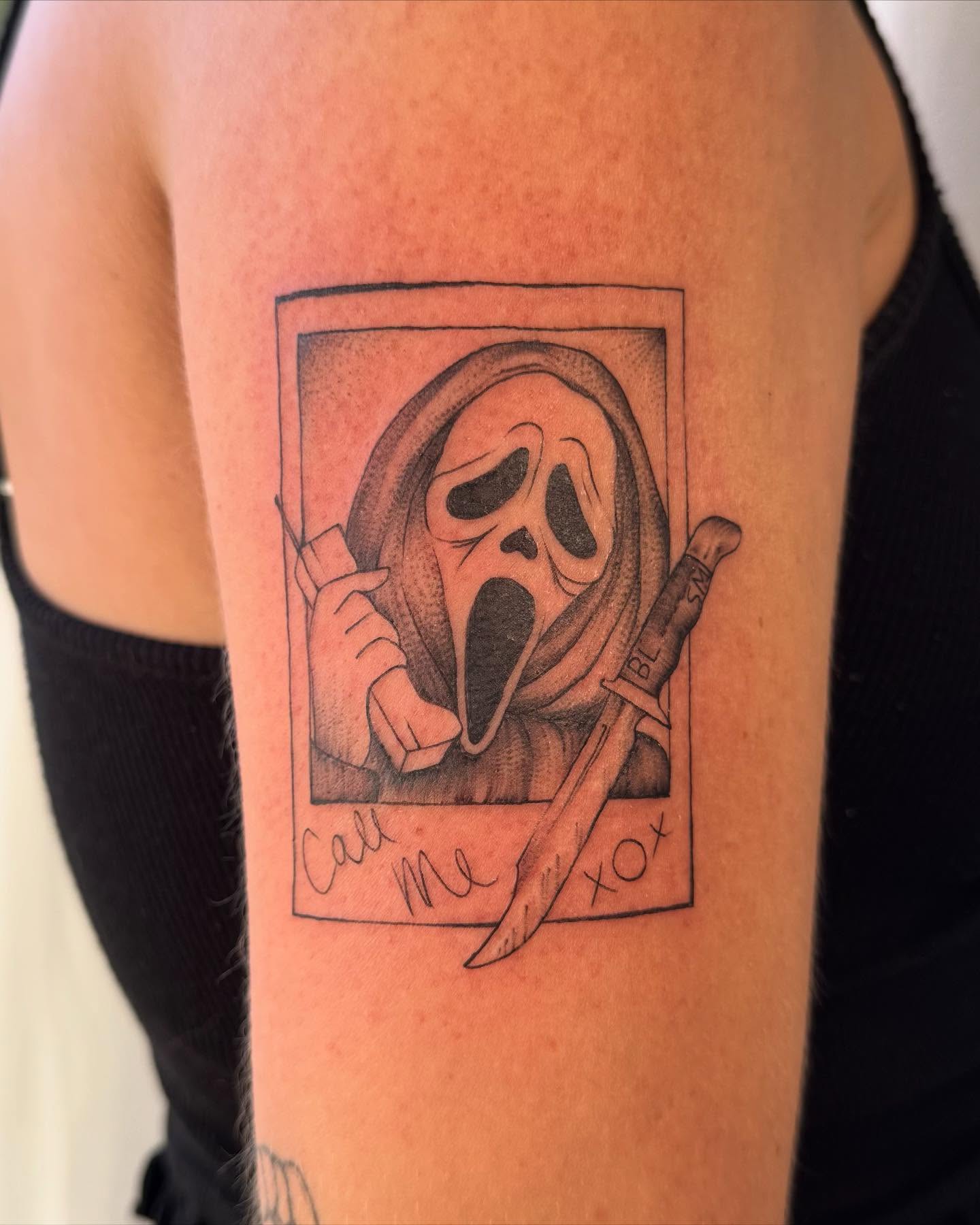 Scream mask black and grey tattoo on the forearm by RyAnn Lynn