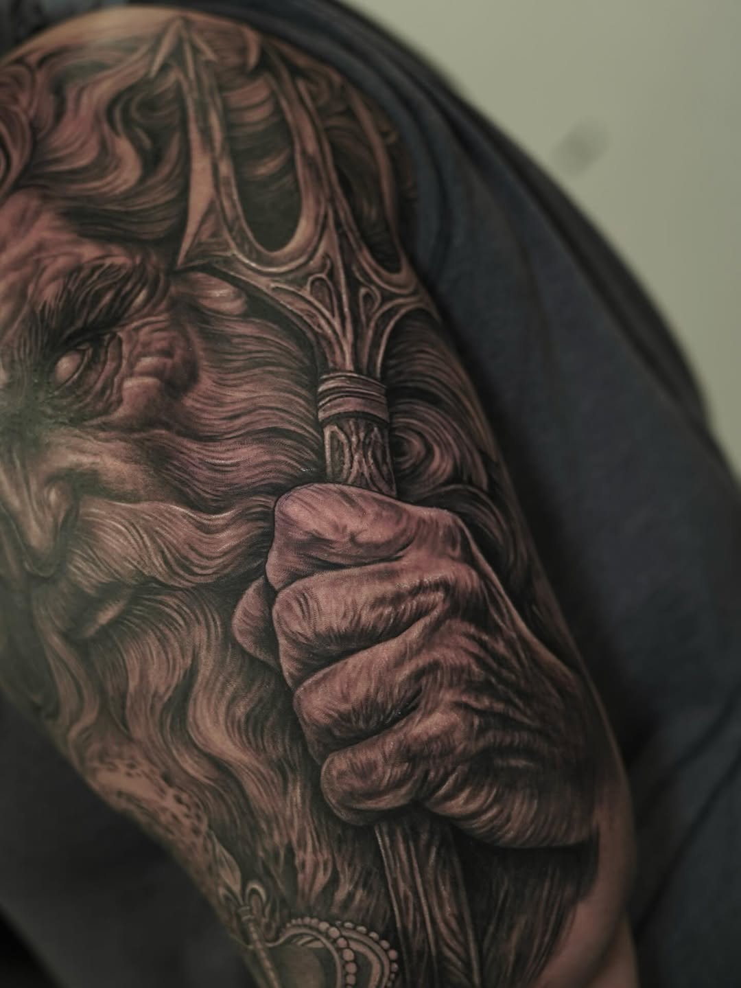 Poseidon with trident Japanese tattoo on the shoulder by Nelson Tellez