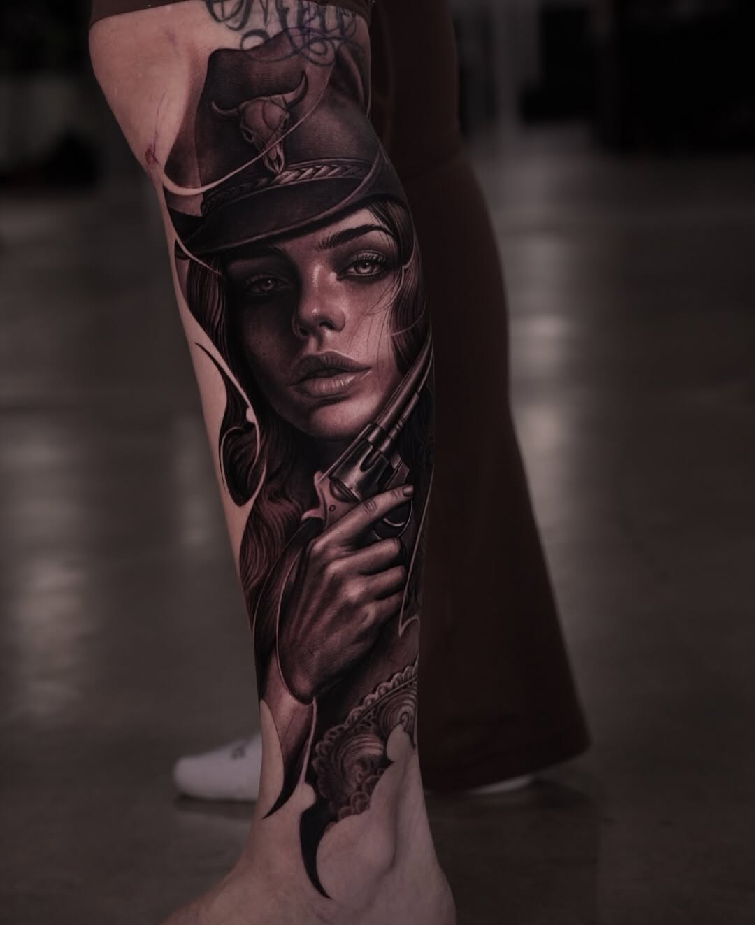 Cowgirl with a gun realism tattoo on the forearm by @_garart_
