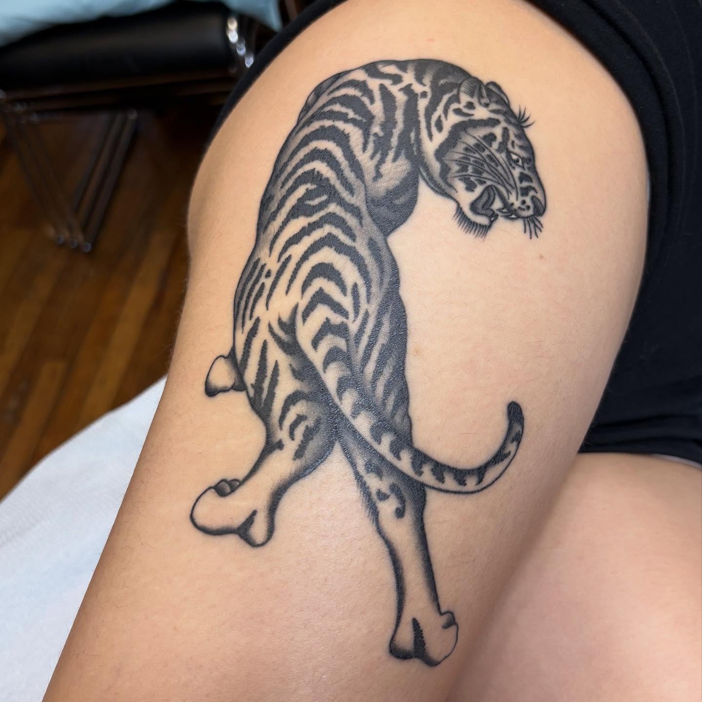Tattoo by @homesicktat2 — black_and_grey