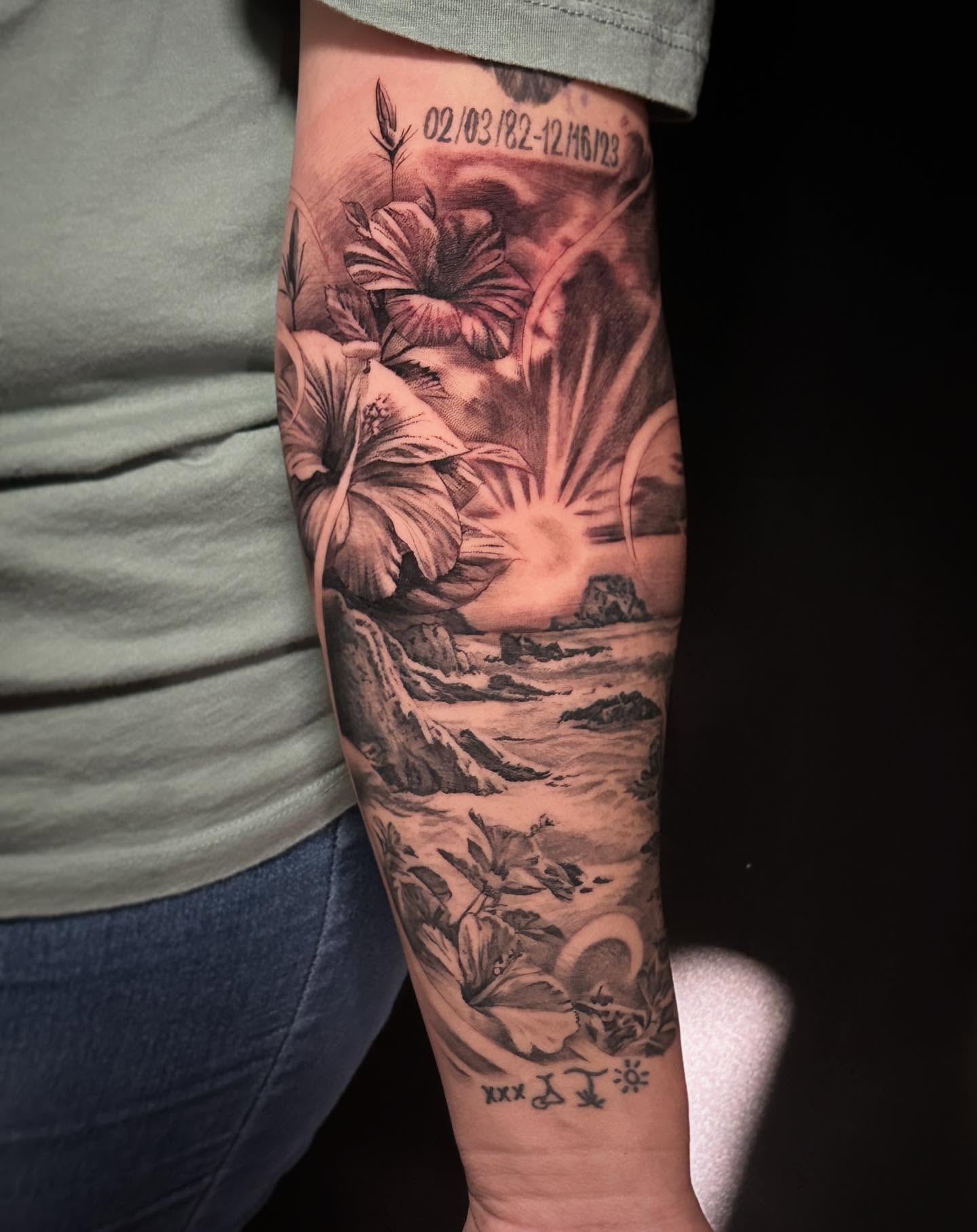 Landscape with flowers realism tattoo on the forearm by "CAM", West Palm Beach, Florida