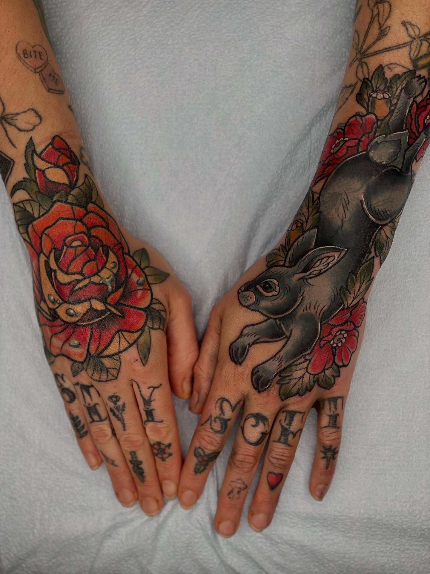 Rose and rabbit American traditional tattoo on the hand by Beeker, Bellingham, Washington