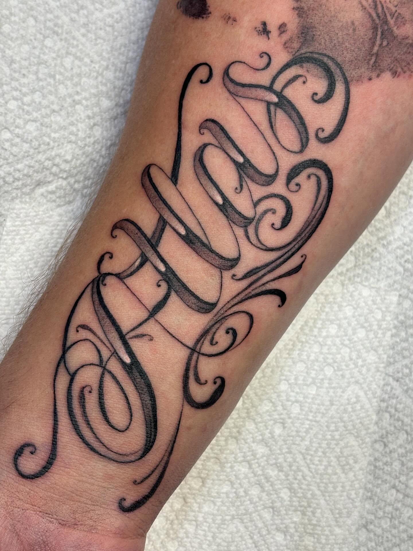 Script lettering lettering script tattoo on the forearm by Storm
