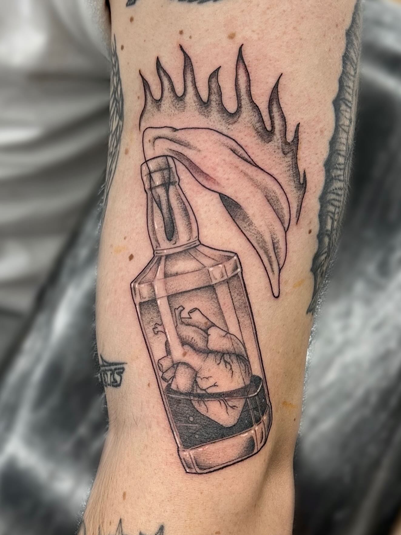 Tattoo by @jack_piscitelli_tattoos — black_and_grey, realism