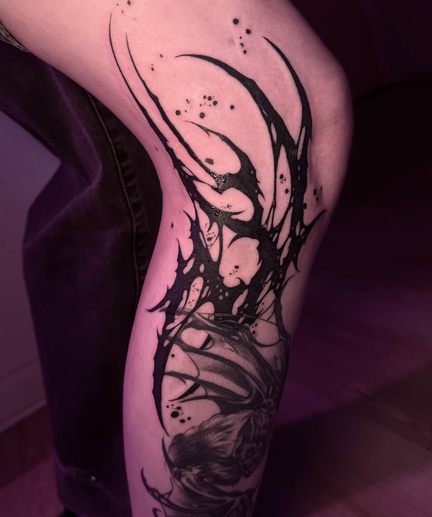Abstract design dotwork tattoo on the thigh by Claire Litsey