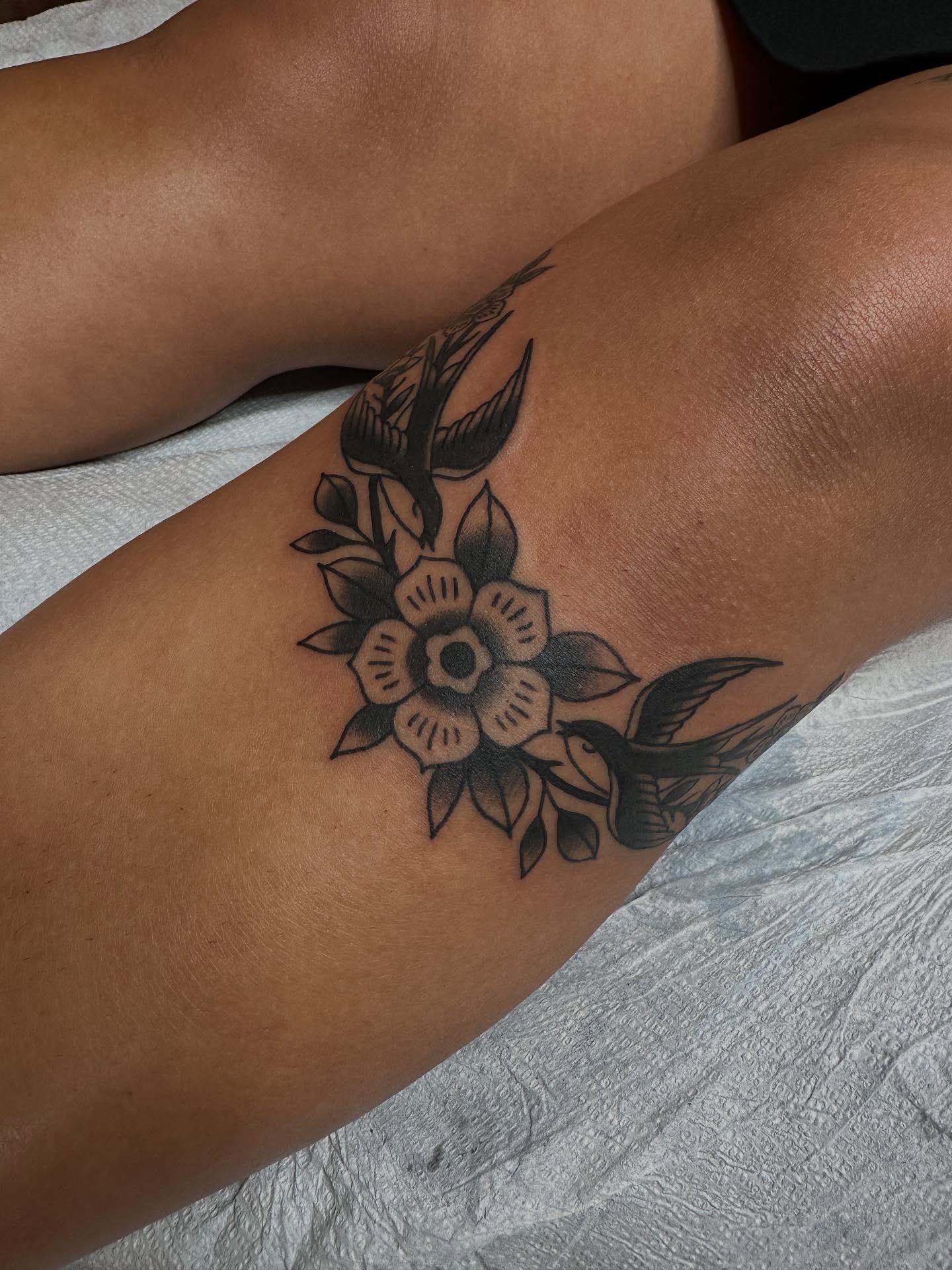 Flower and birds black and grey tattoo on the leg by Whitney Creep Tattoos