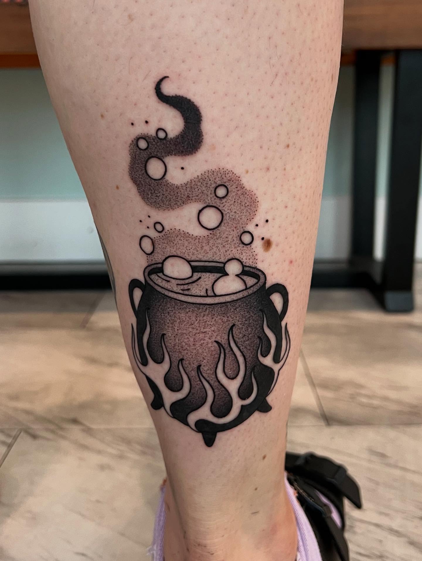 Cauldron with boiling potion black and grey tattoo on the forearm by 𝖆𝖑𝖞𝖘𝖘𝖆 ☽