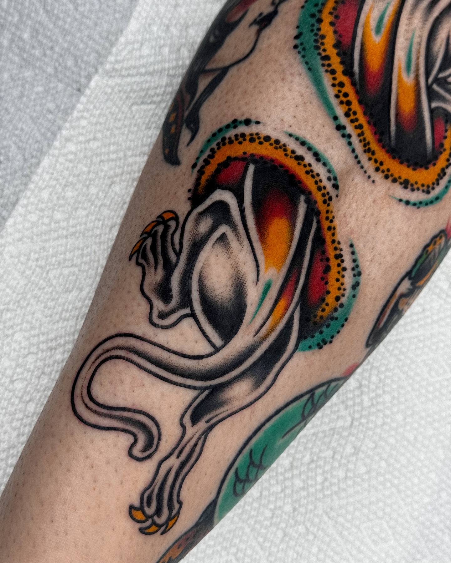 Serpent dotwork tattoo on the forearm by Samuel Dickey