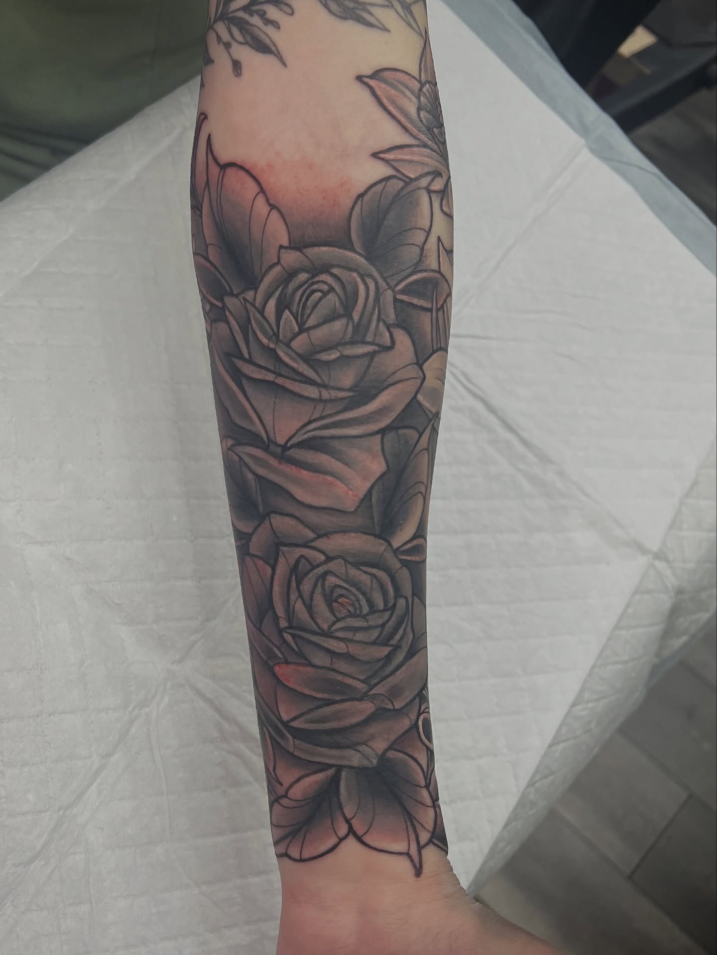 Roses black and grey tattoo on the forearm by BodyArtByAlia