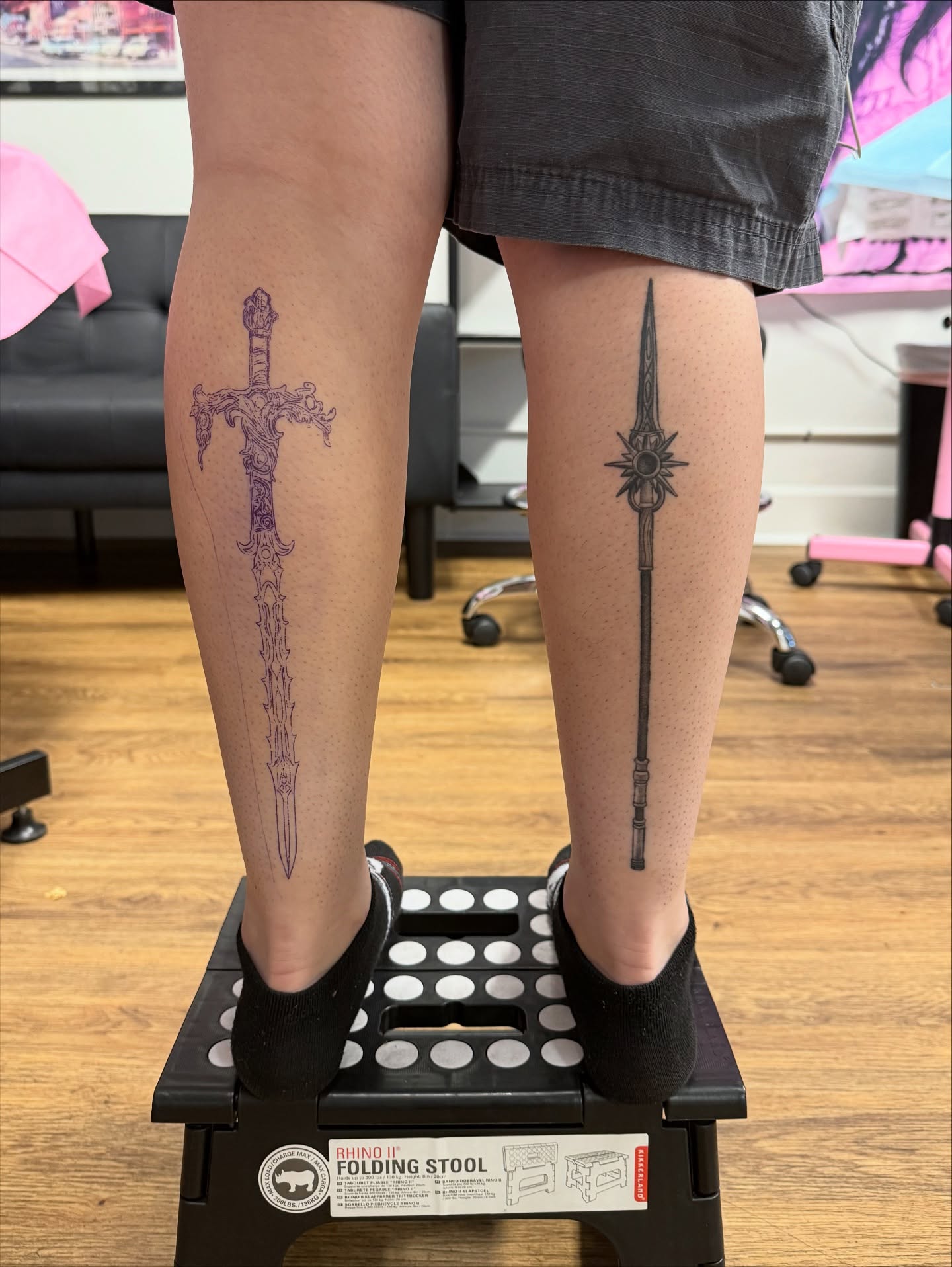 Sword and spear black and grey tattoo on the leg by z o y a, Seattle, Washington