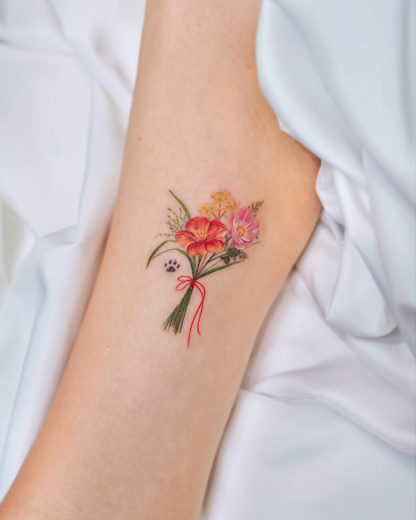 Tattoo by @yous_tattoo — watercolor
