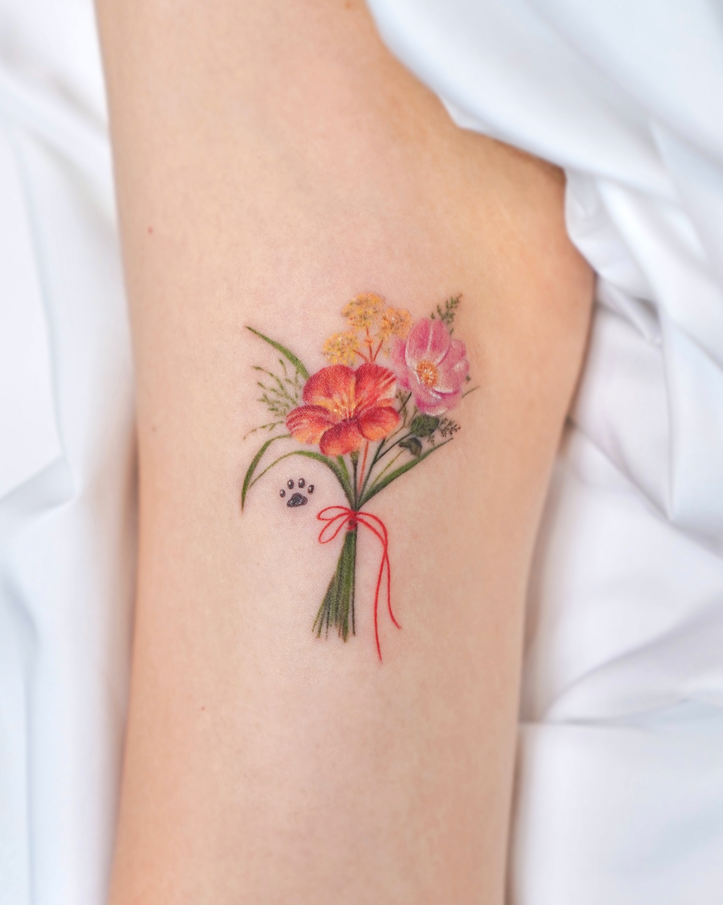 Tattoo by @yous_tattoo — realism, watercolor