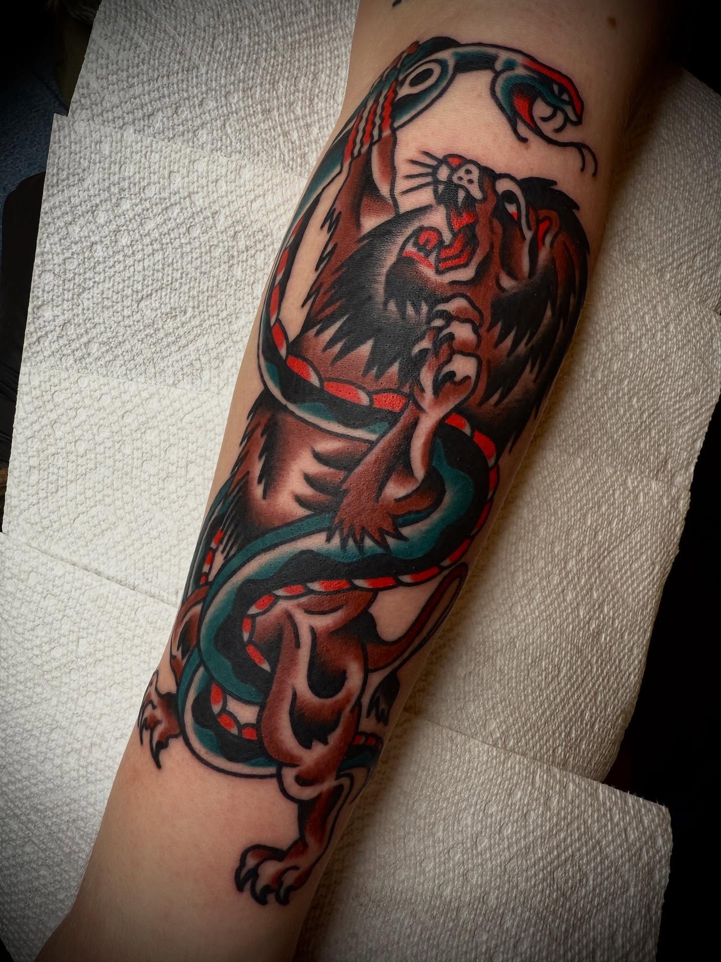Dragon American traditional tattoo on the forearm by Tristan Bradshaw