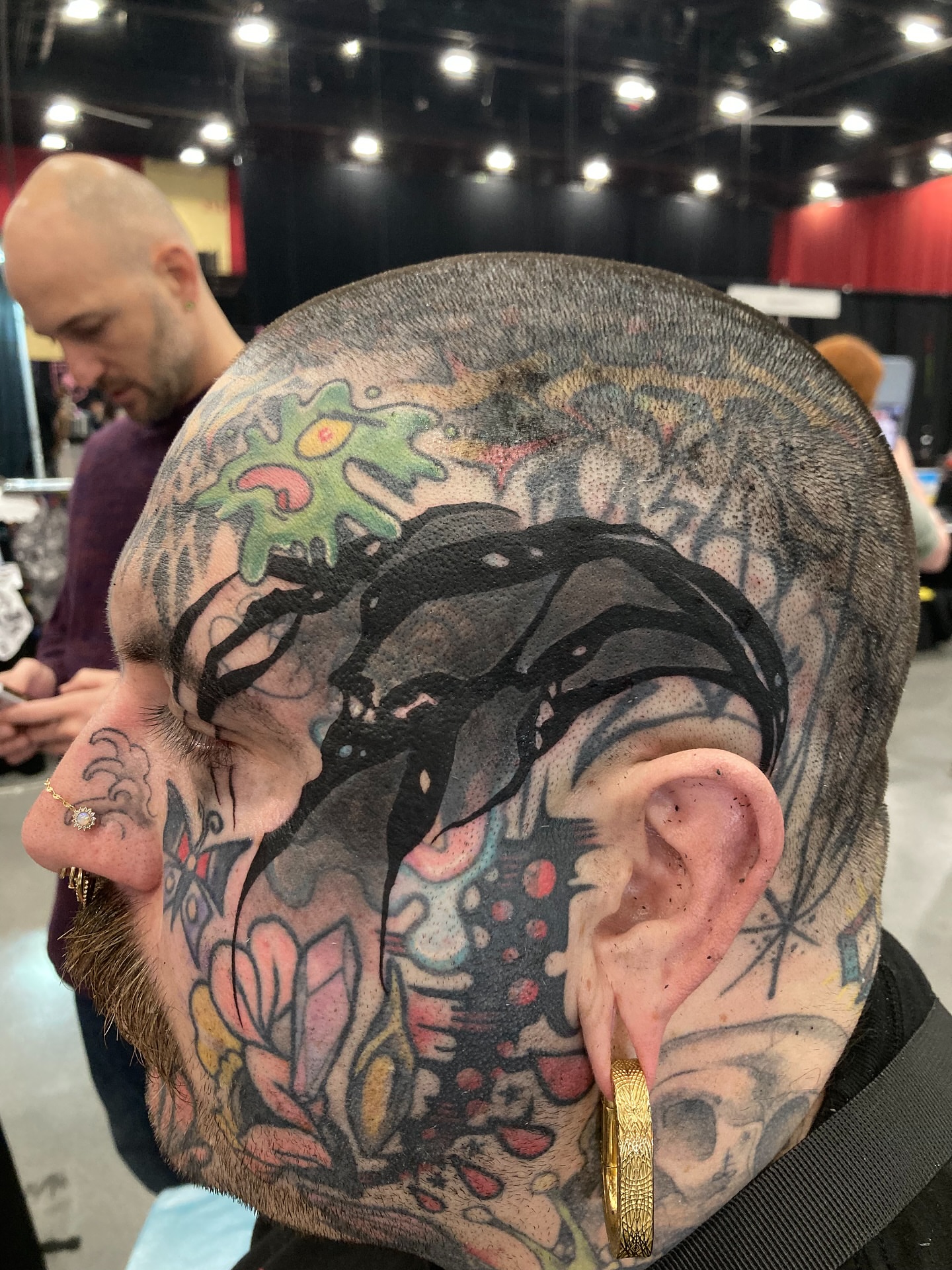 Abstract surrealism tattoo on the head by Rizzie D'Alterio