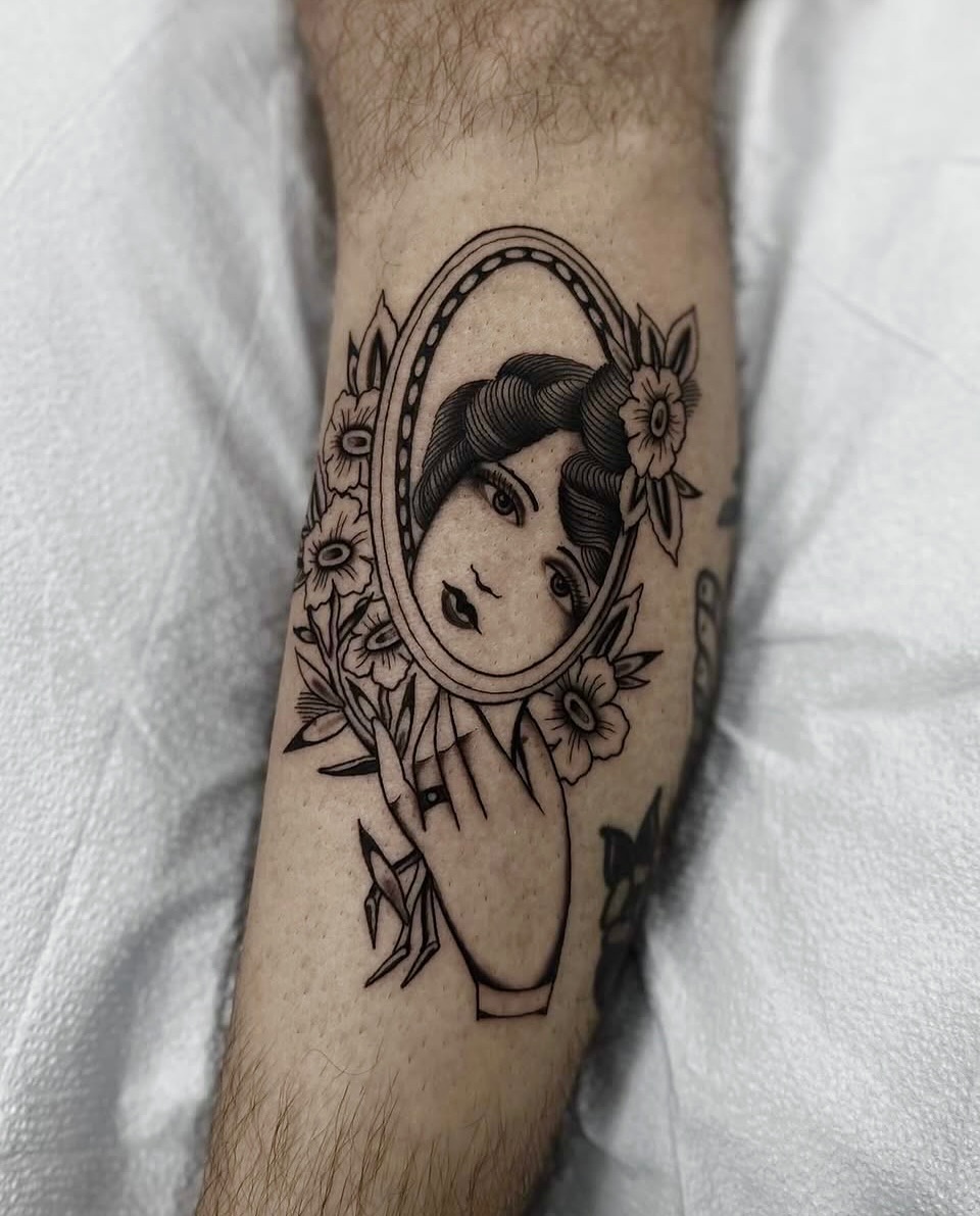 Mirror reflection illustrative tattoo on the forearm by Nicholas Lee, San Francisco, California
