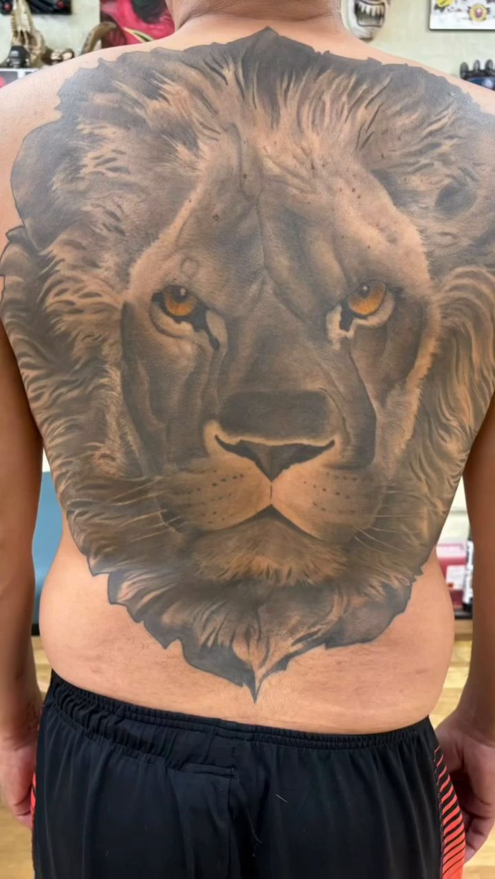 Lion's face realism tattoo by Rene Chavira