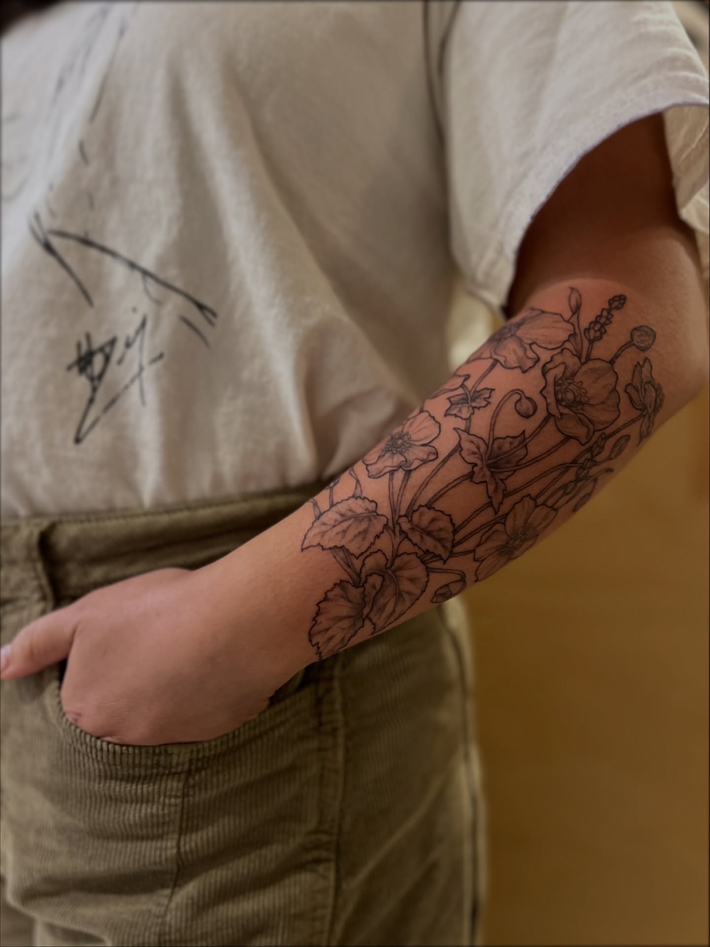 Floral design black and grey tattoo on the forearm by Kelsi Hooper, Seattle, Washington
