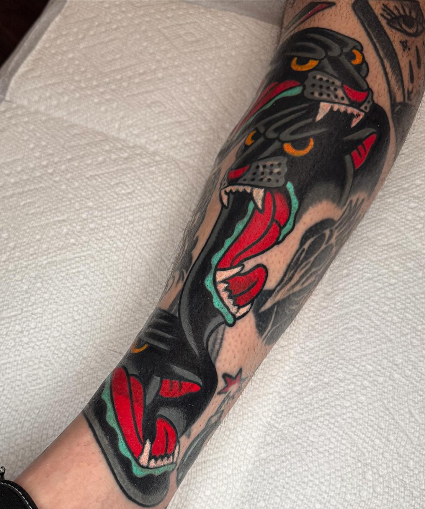 Panther American traditional tattoo on the forearm by James Shepherd, Austin, Texas