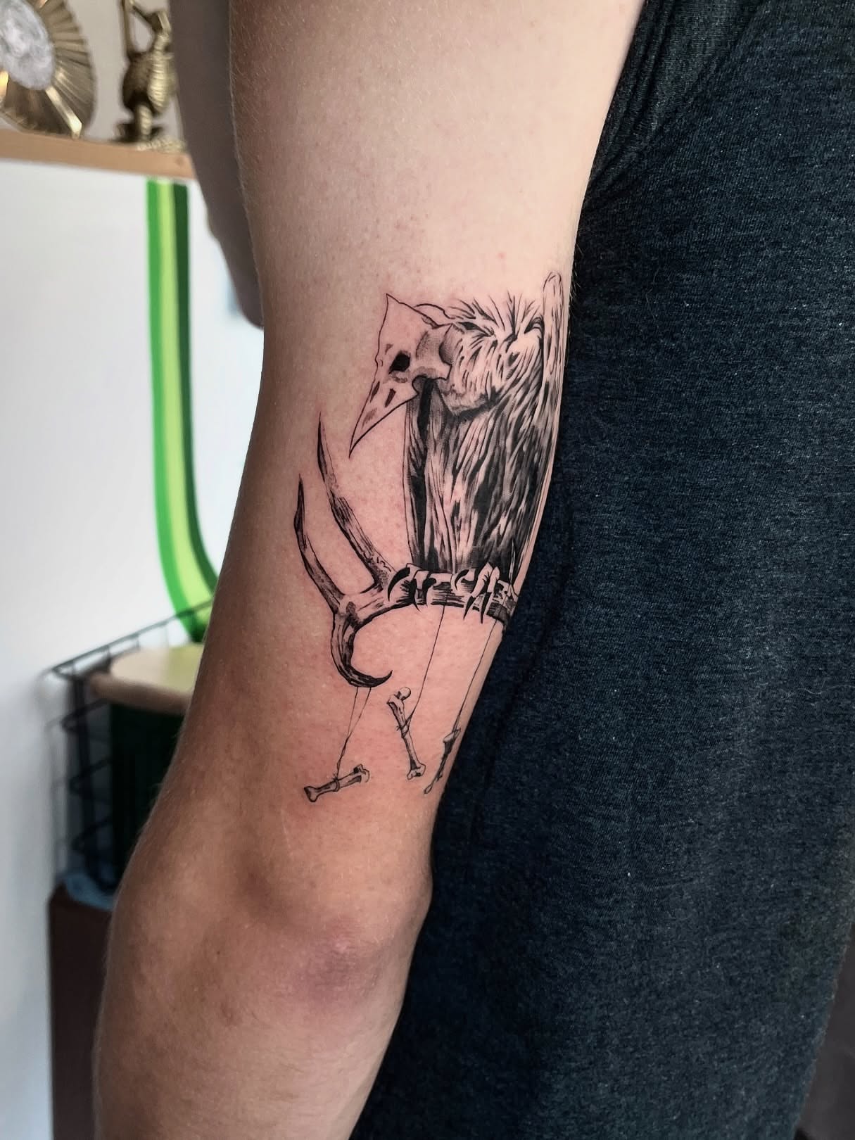 Owl and antlers black and grey tattoo on the forearm by Samantha