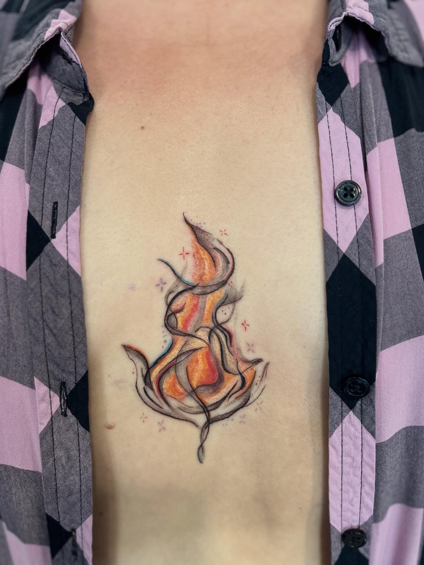 Flame watercolor tattoo on the ribs by Elizabeth (Lib), Murfreesboro, Tennessee