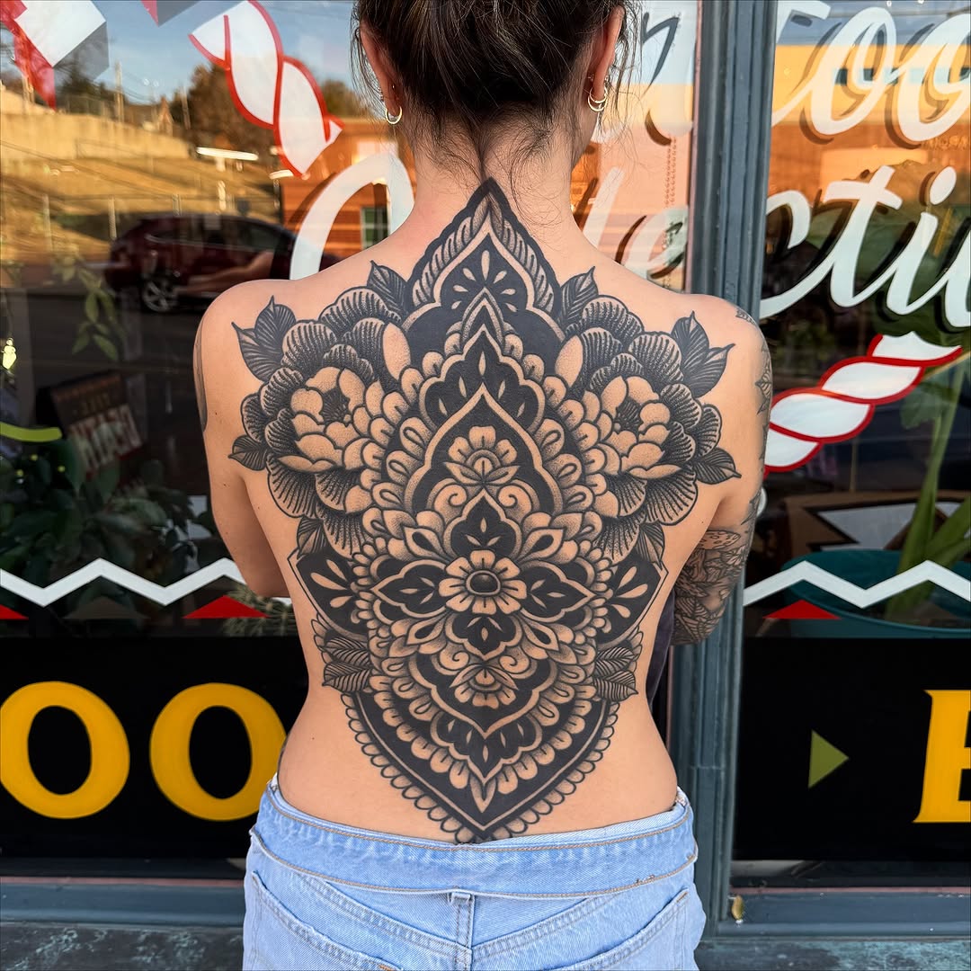 Full back mandala tribal tattoo on the back by kenneth nash