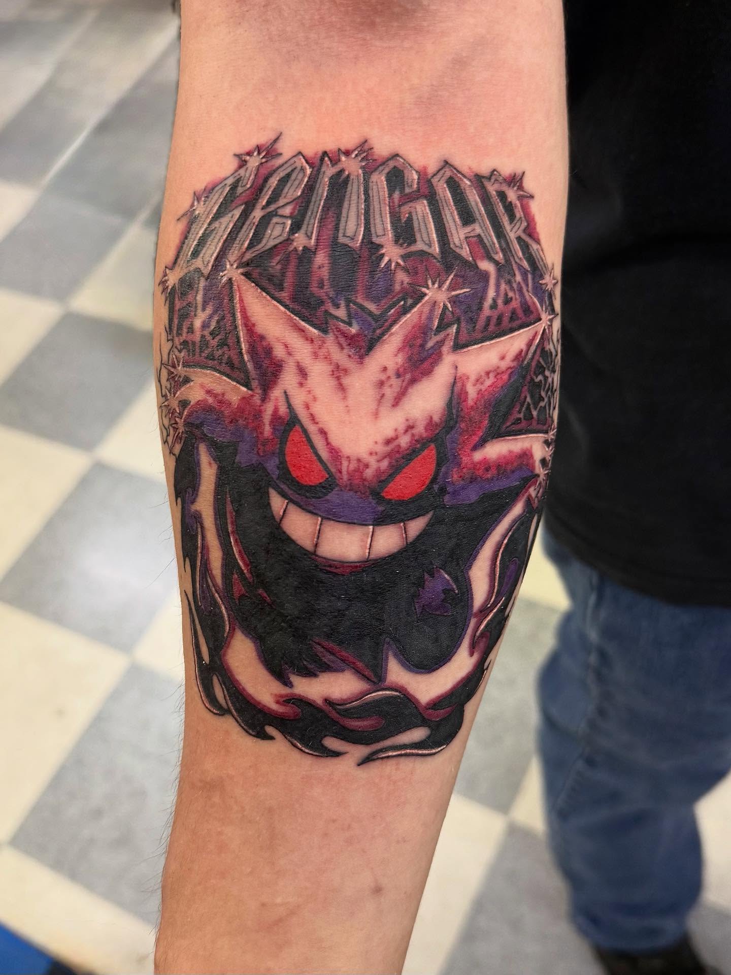 Gengar dark realism tattoo on the forearm by Manny