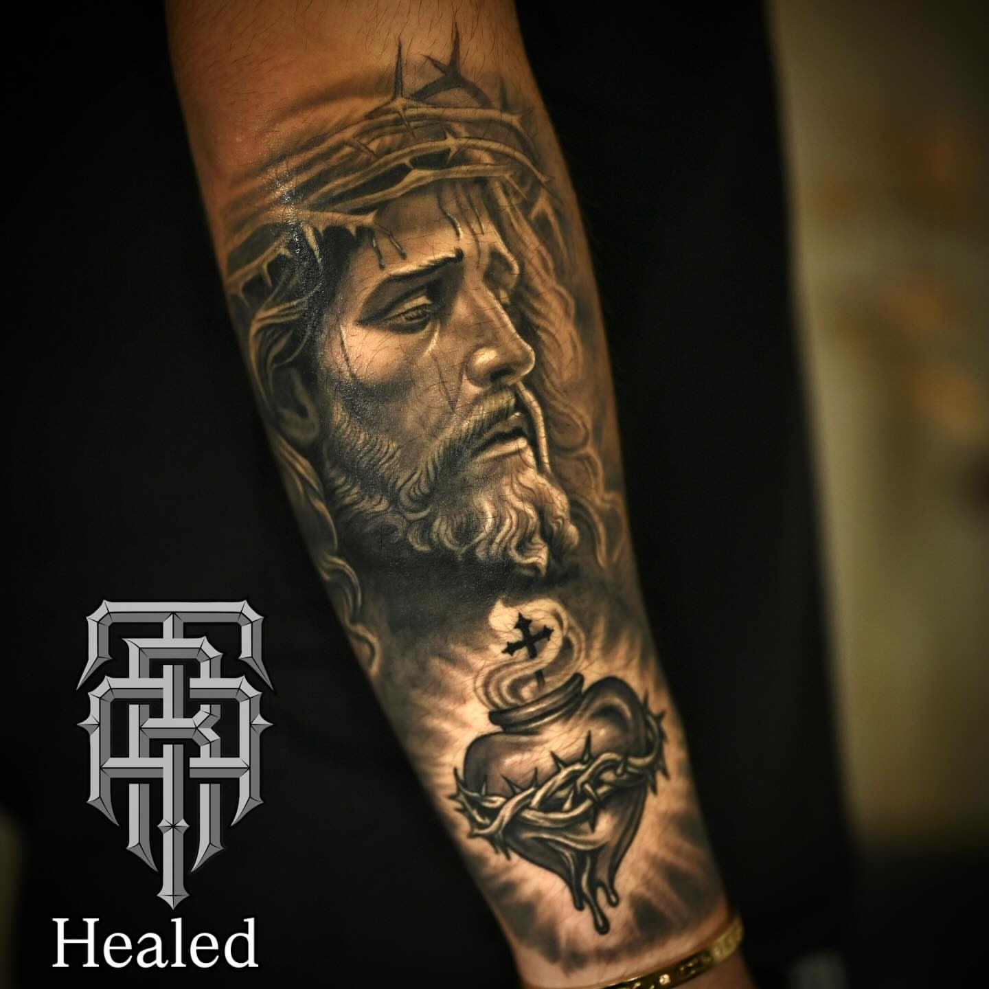 Jesus Christ realism tattoo on the forearm by Art Lopez