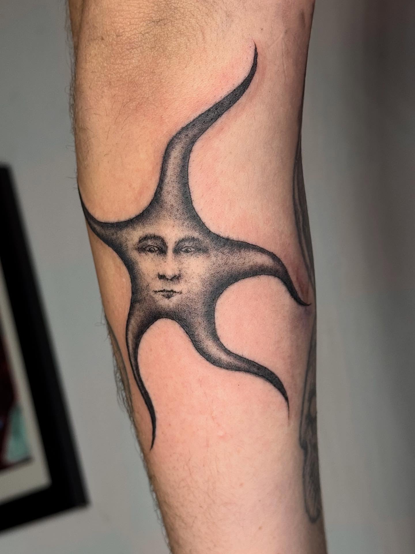 Abstract face dotwork tattoo on the forearm by @mr.smiley___