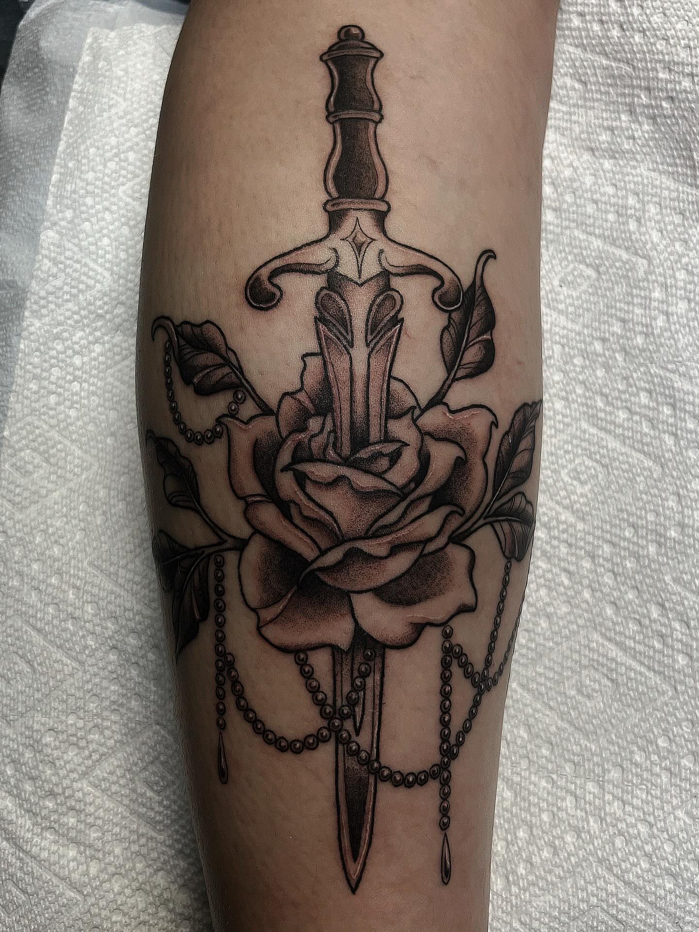 Sword and rose realism tattoo on the forearm by β
πΈππππ β