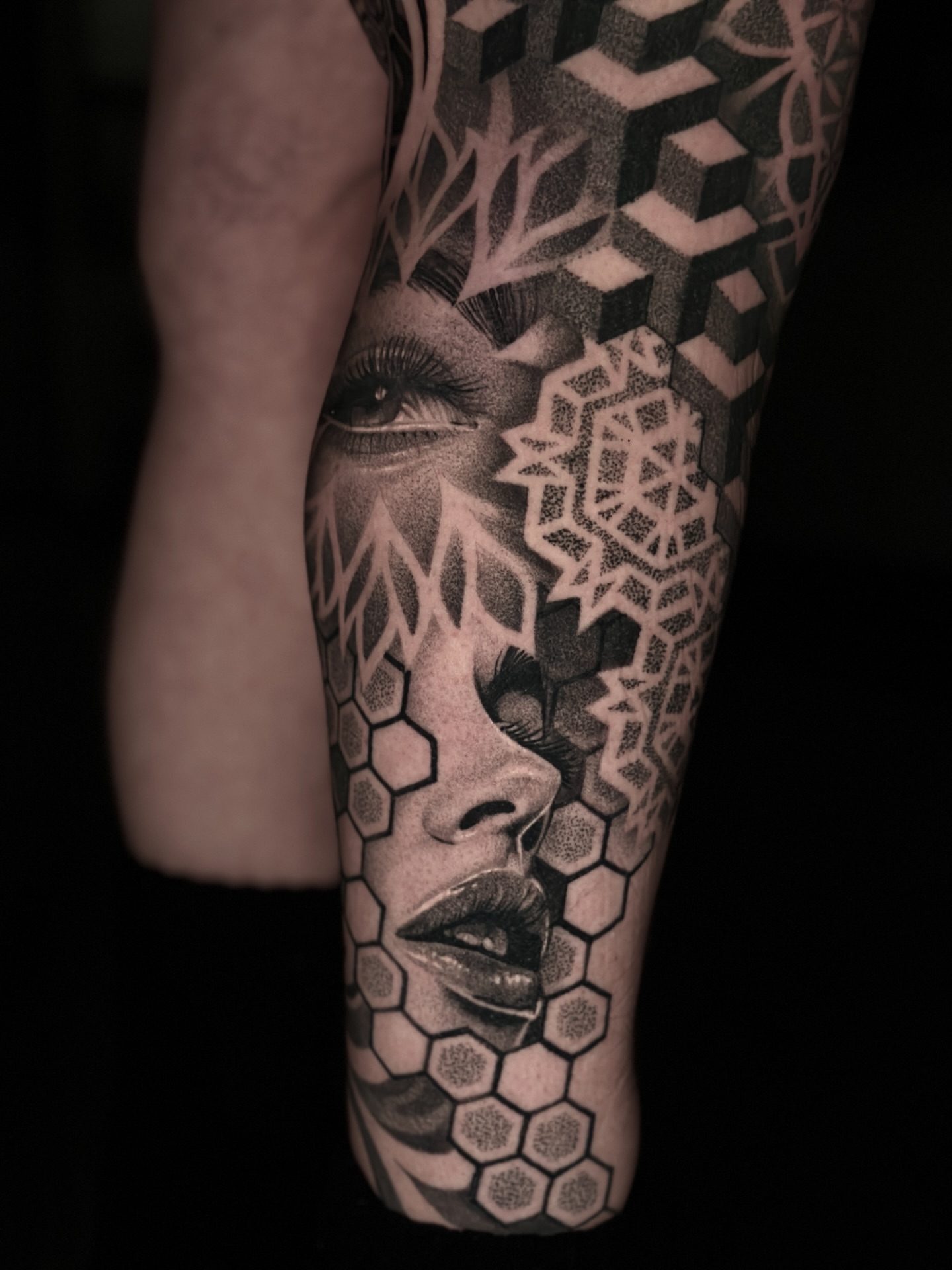 Geometric woman dotwork tattoo on the forearm by Nick Fierro