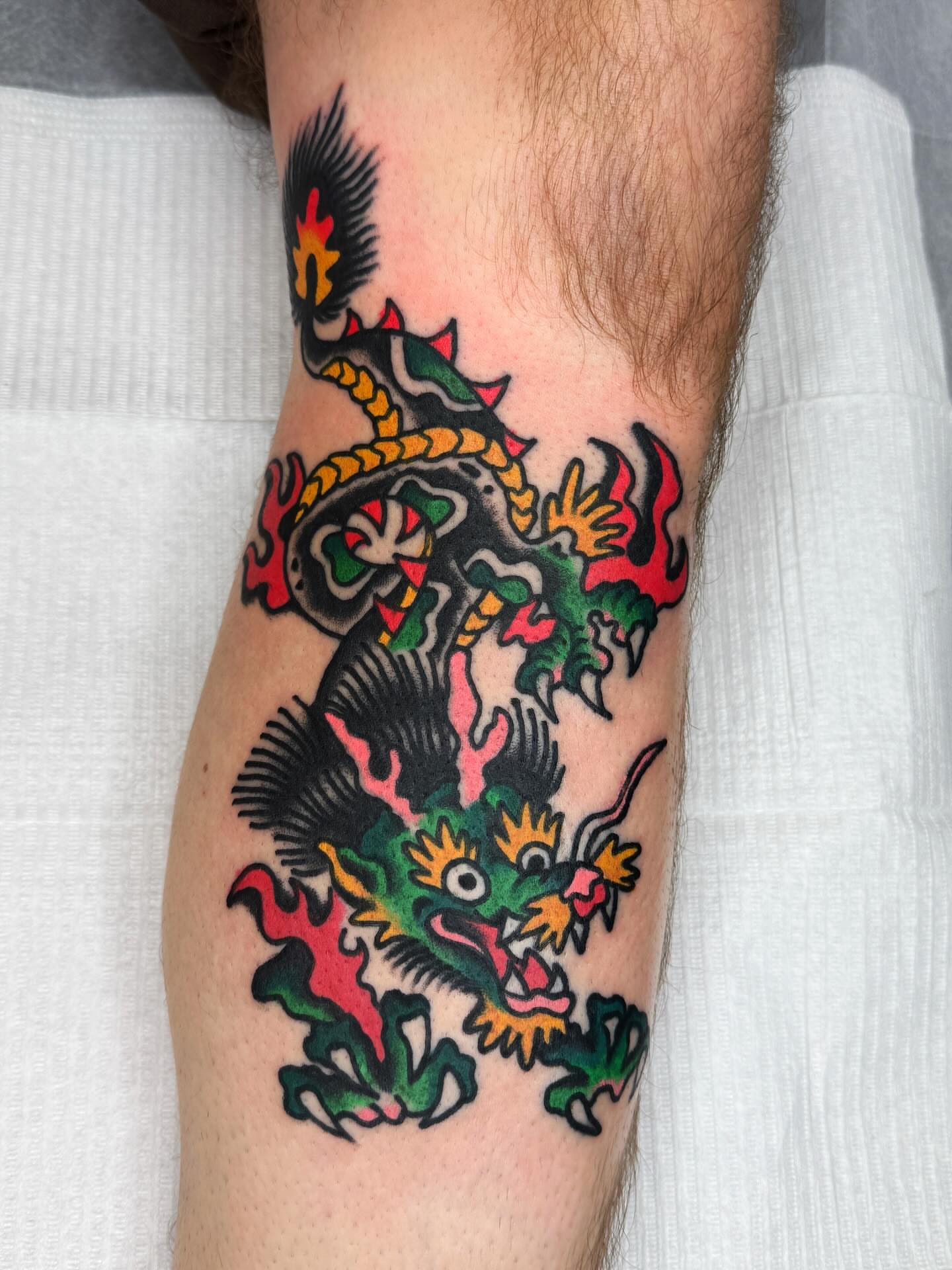 Dragon American traditional tattoo on the forearm by Jimmy Ho
