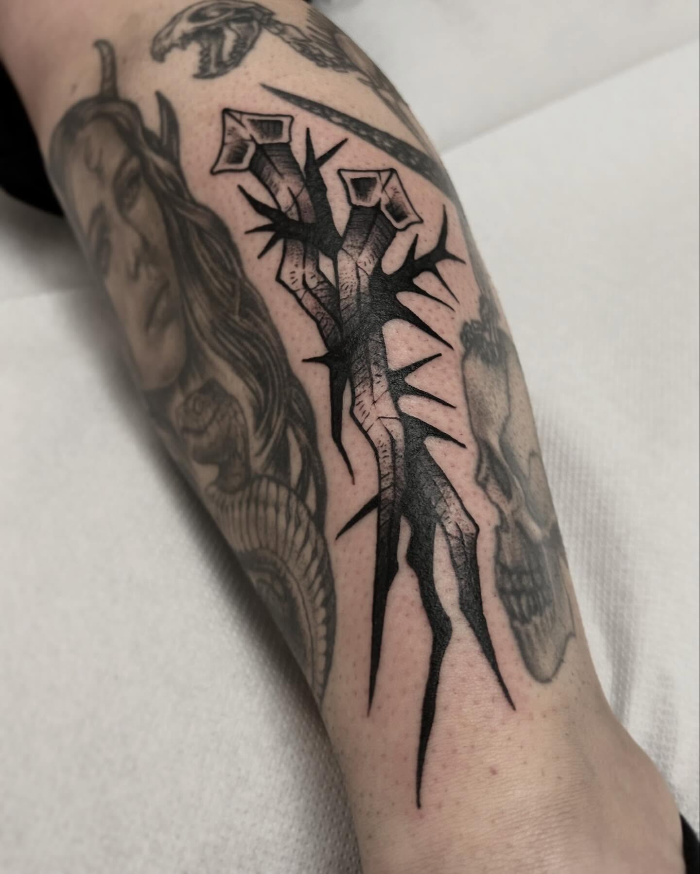 Tattoo by @da.voide_tattoo — black_and_grey