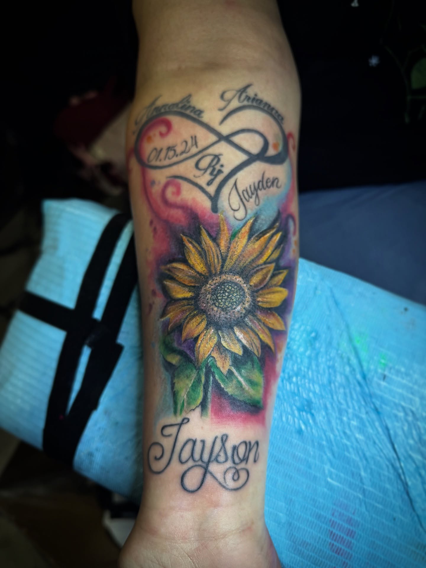 Sunflower realism tattoo on the forearm by Christa Martinez