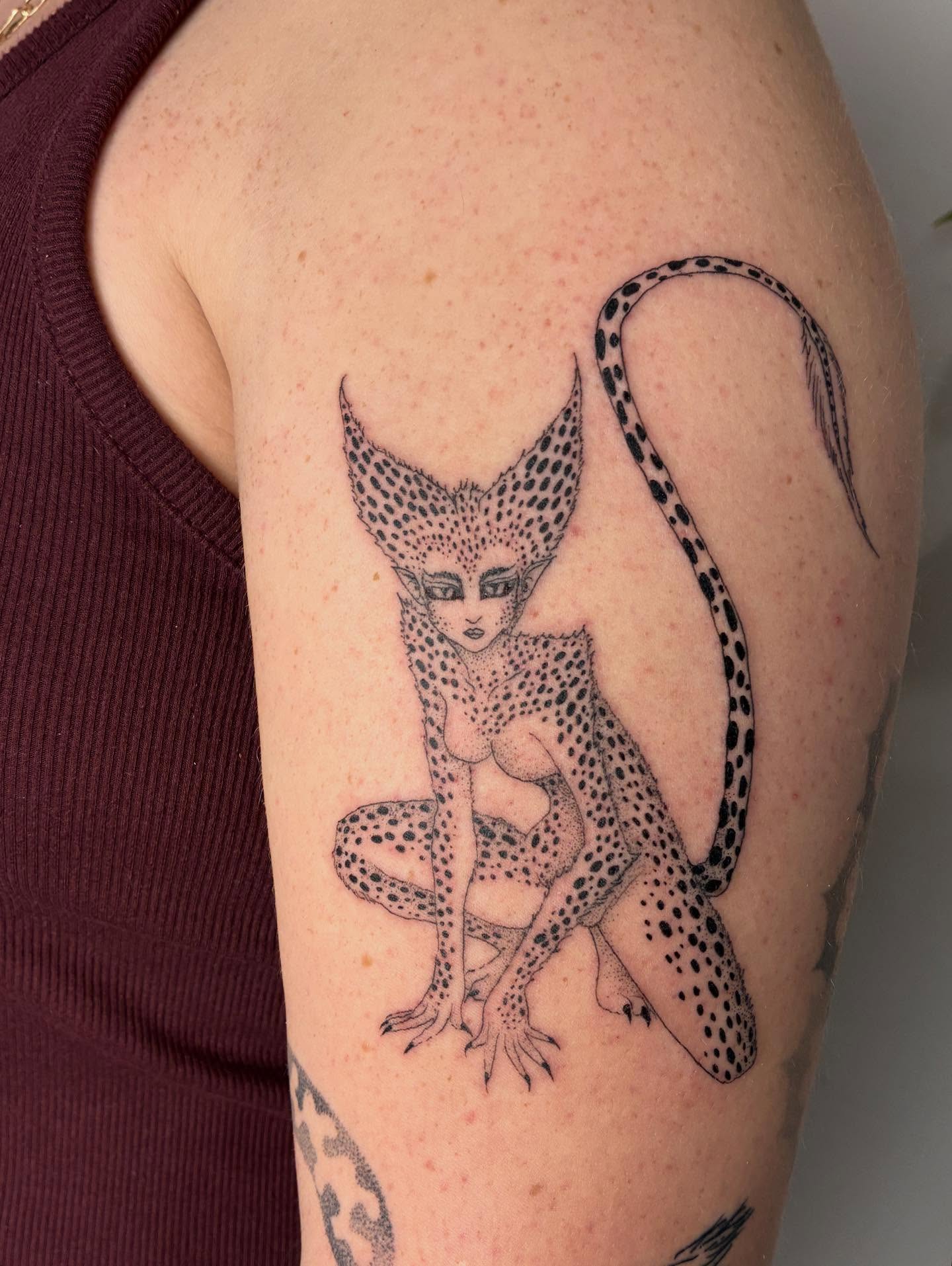 Cat woman black and grey tattoo on the upper arm by ∘≁≀Gæish∀ ⍕ ◯⊂ⅇl⌾tl≀≁∘