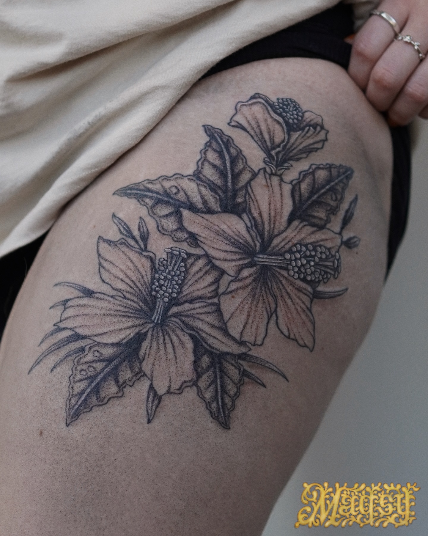 Hibiscus flowers dotwork tattoo on the thigh by Magsy, Orange, California