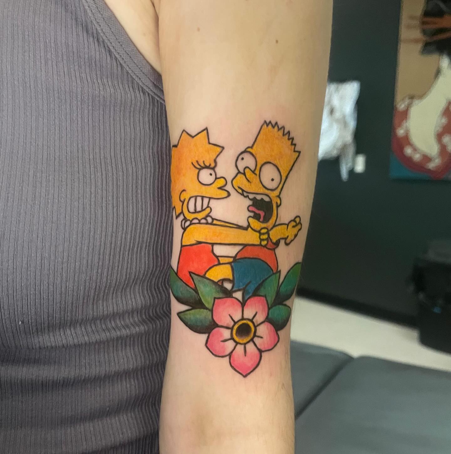 Simpsons characters new school tattoo on the forearm by Logan Casimir