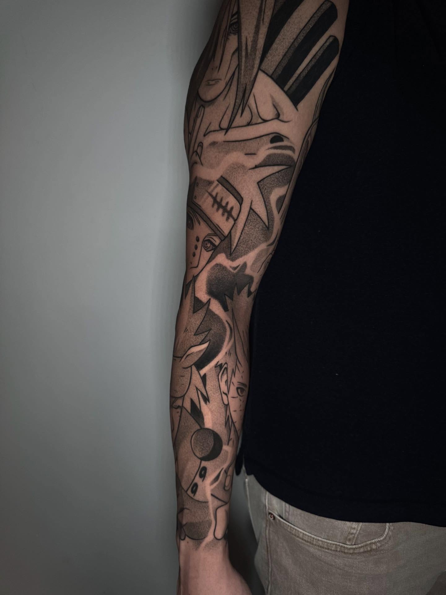 Football player black and grey tattoo on the forearm by Anthony D. Rustik