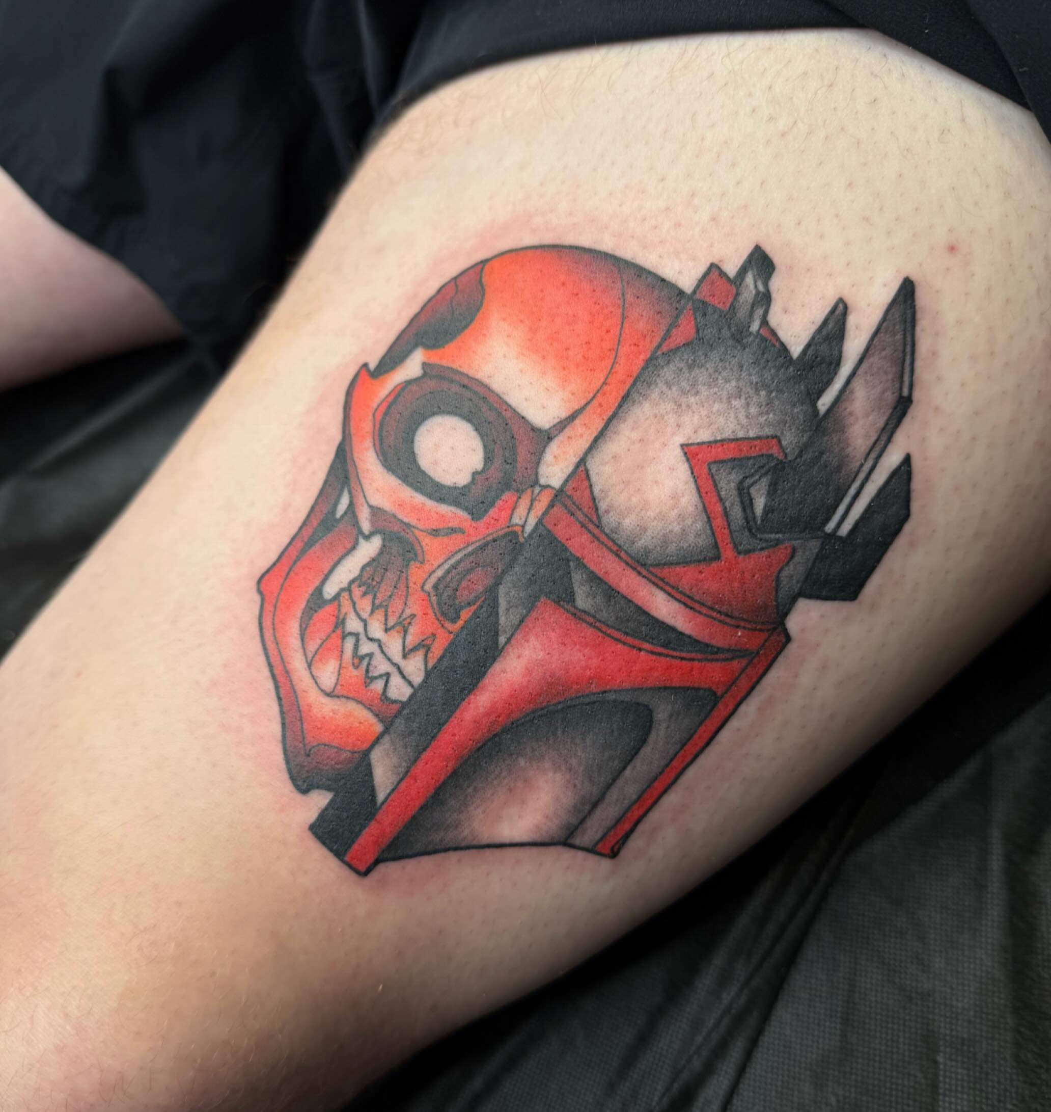 Skull helmet geometric tattoo on the thigh by Chase Martines