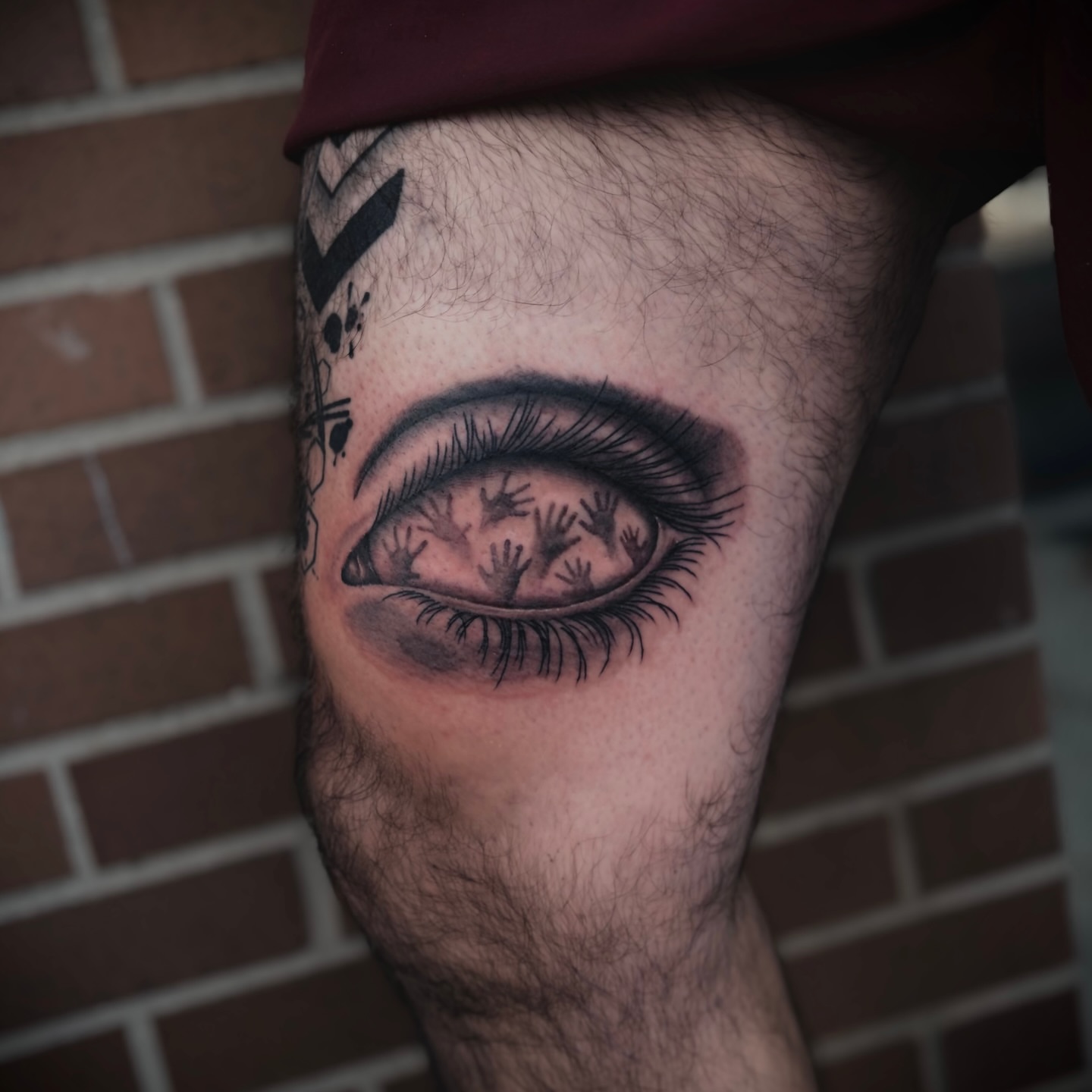 Eye realism tattoo on the thigh by Lauren Dempsey, Dearborn, Michigan