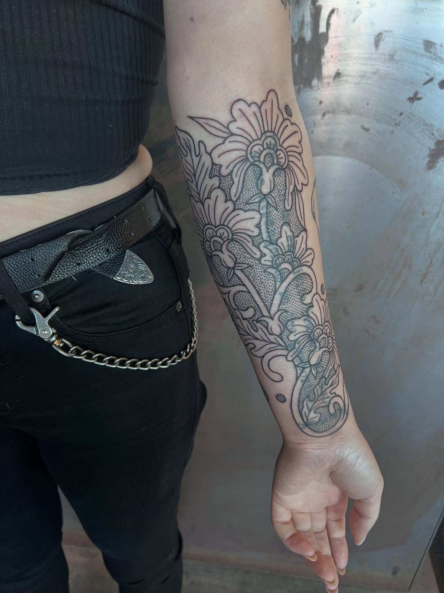 Floral pattern dotwork tattoo on the forearm by Siërra Nicole, Minneapolis, Minnesota