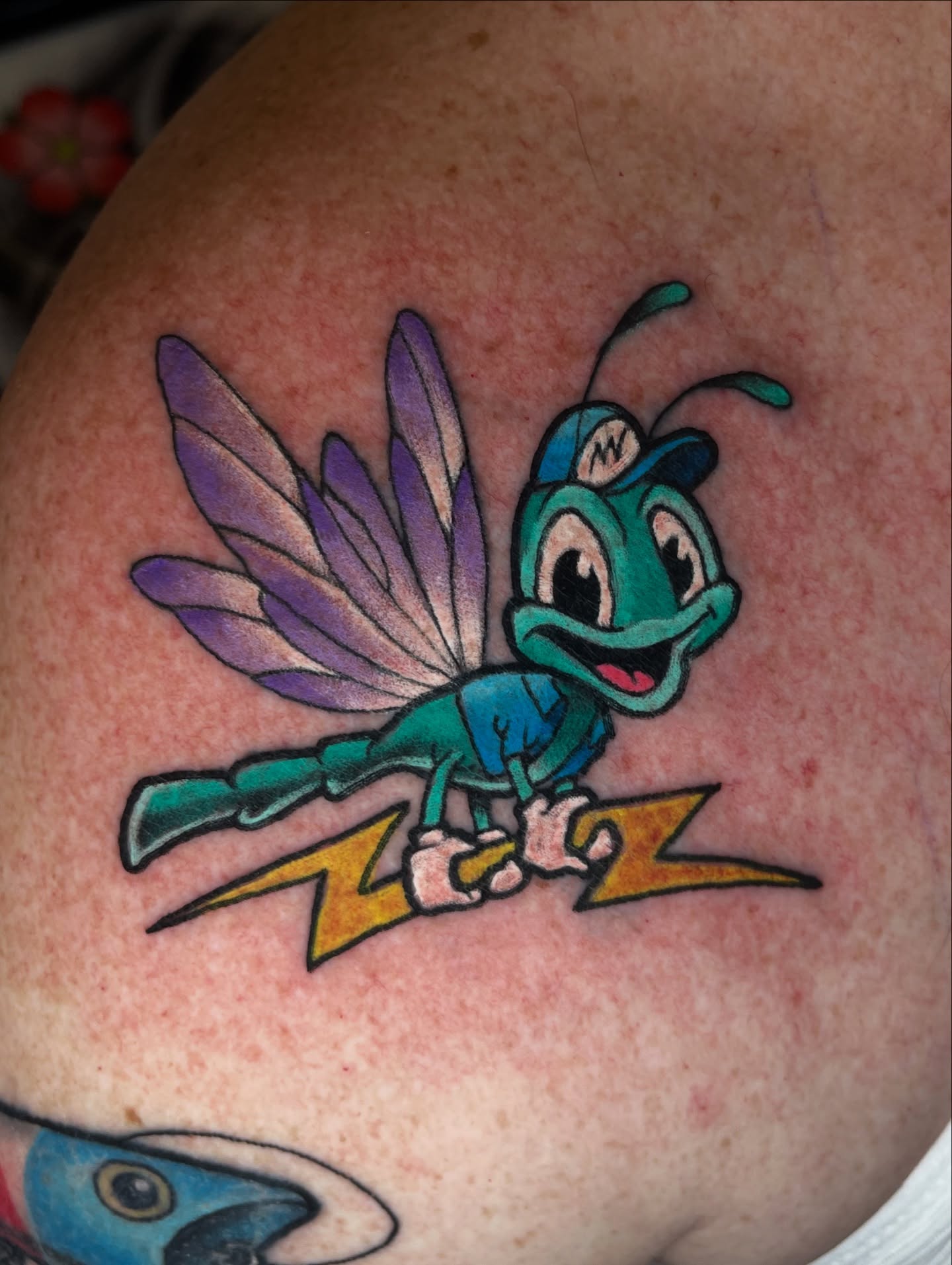 Fly American traditional tattoo on the shoulder by James Mullin