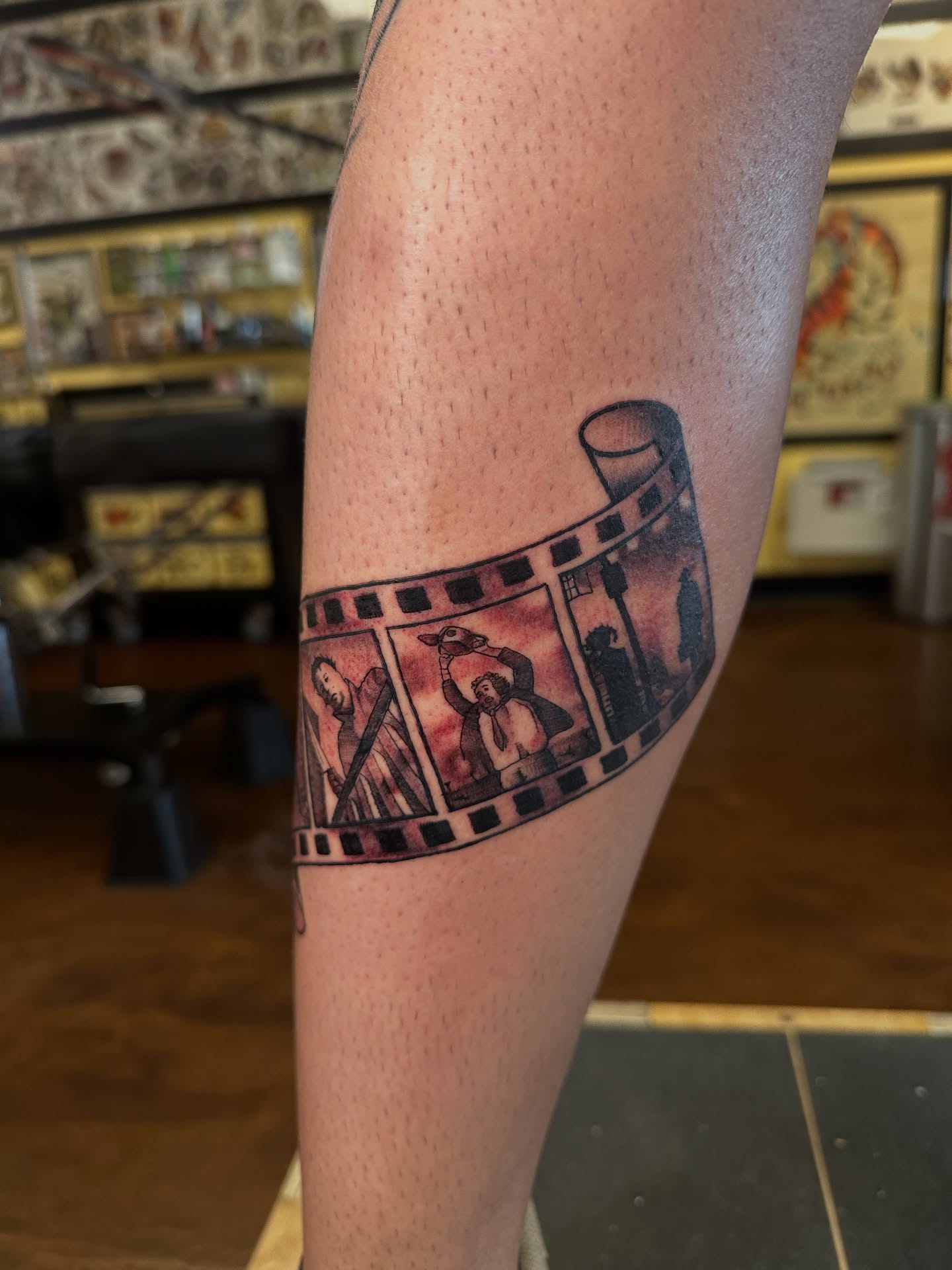 Film strip black and grey tattoo on the forearm by Nick Bones, Las Vegas, Nevada