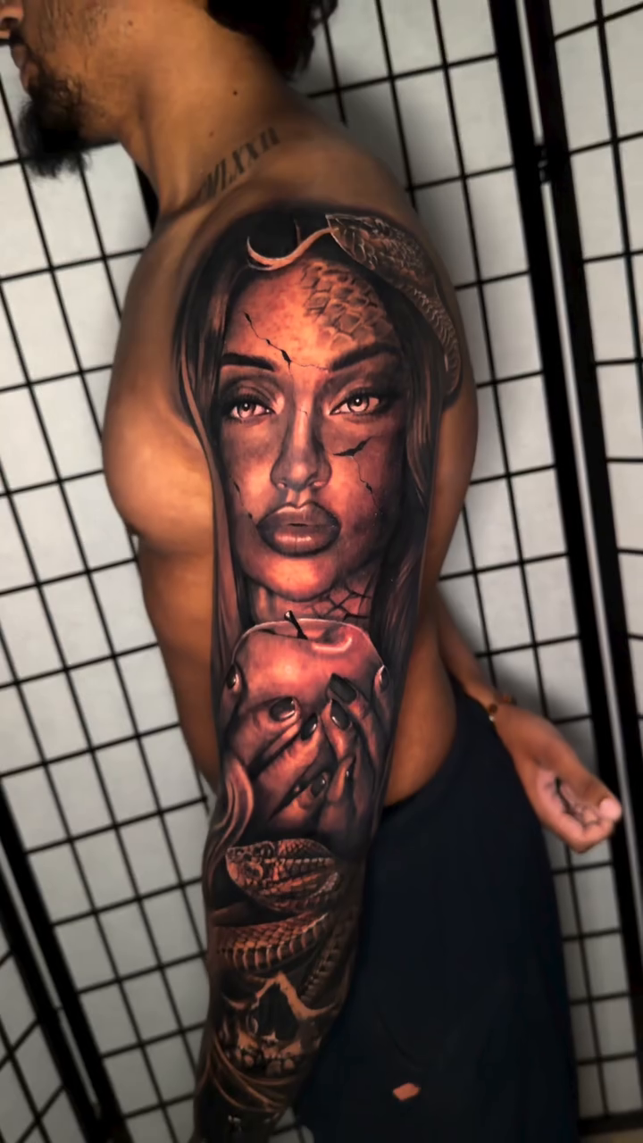 Woman and snake realism tattoo by Anthony Ramirez