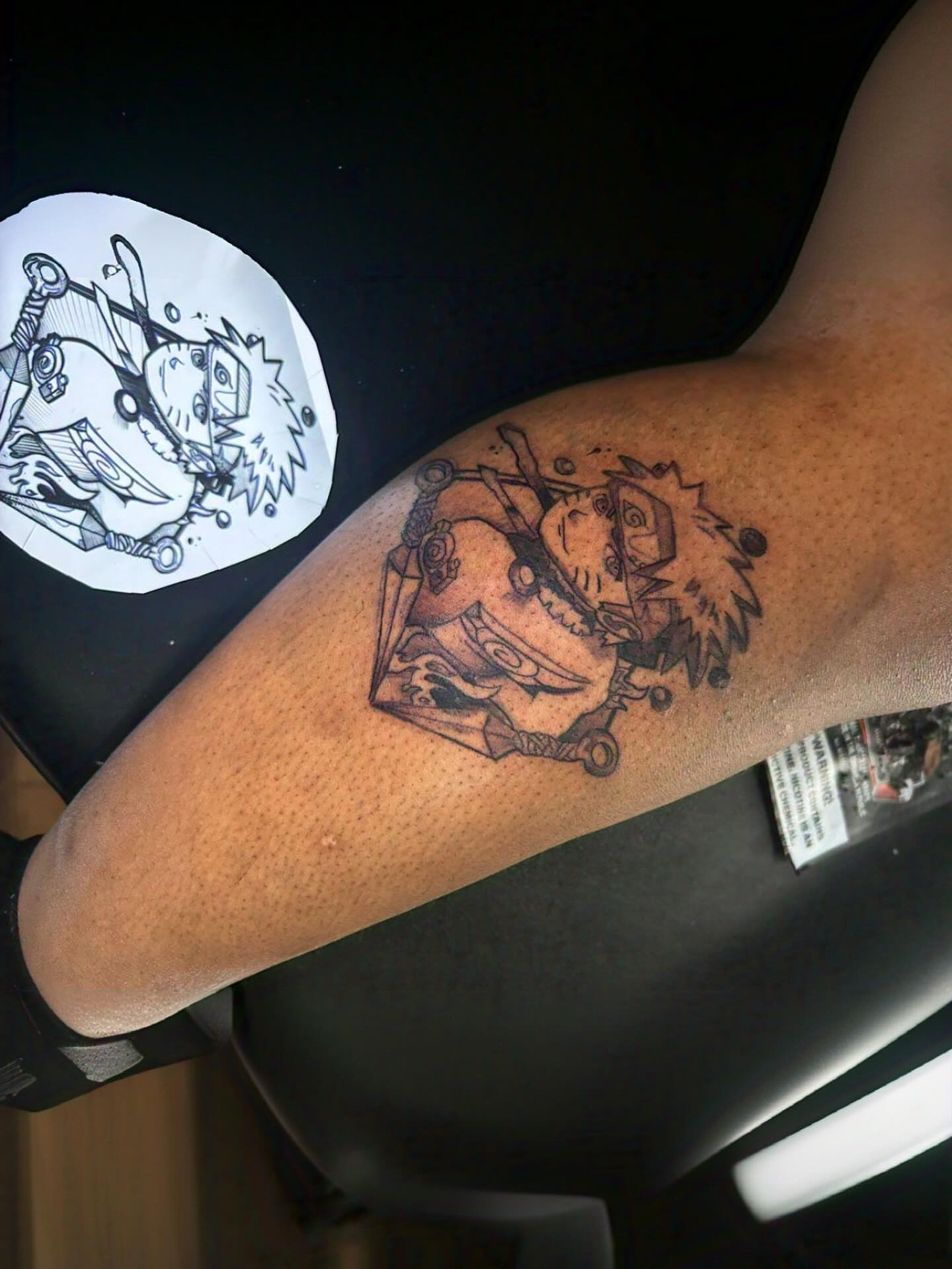 Naruto character black and grey tattoo on the forearm by Detroit tattoo Artist
