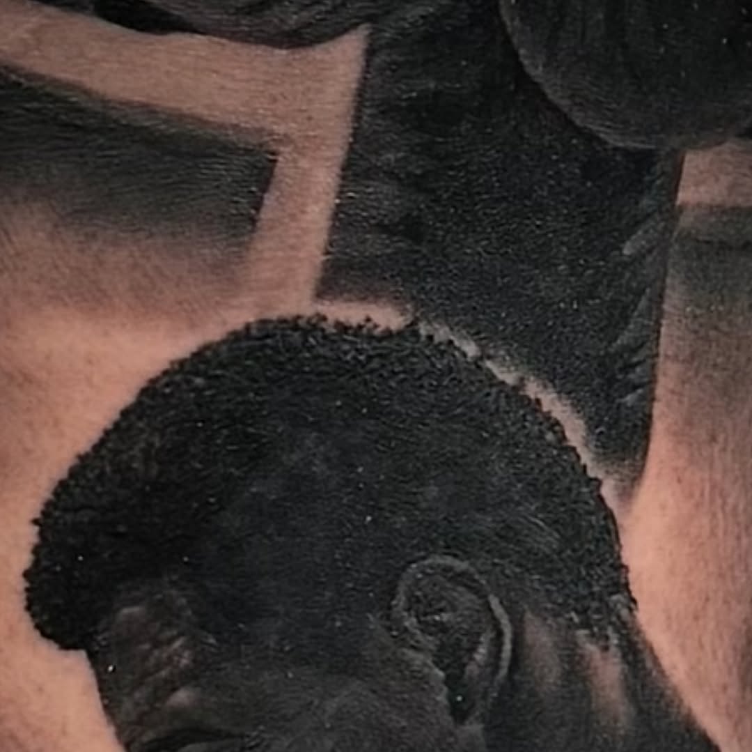 Portrait of a man Chicano tattoo on the chest by Angels tattoo