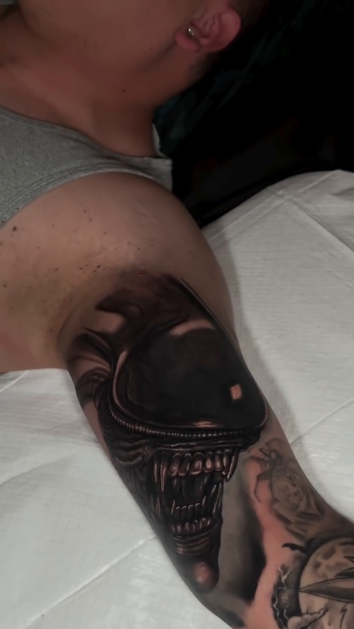Xenomorph alien head dark realism tattoo by Isaac