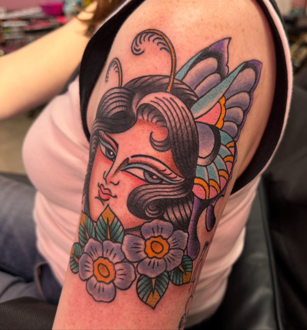 Geisha head with butterfly wings American traditional tattoo on the shoulder by Tannis - Traditional Tattoos in Richmond, VA, Richmond, Virginia