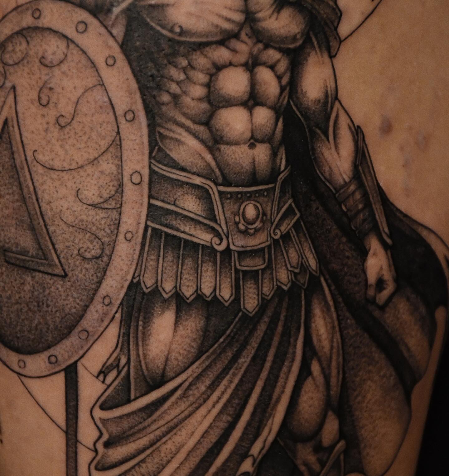 Muscular warrior black and grey tattoo on the torso by Gary Zhong, Upland, California