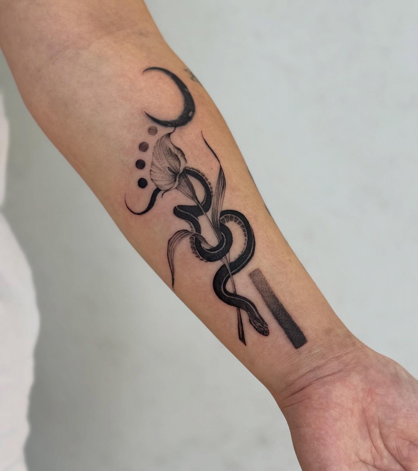 Snake and lotus dotwork tattoo on the forearm by Karina ⋆⭒˚.⋆